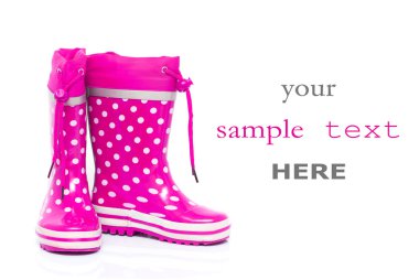 Pink rubber boots for kids isolated on white background (with space for text) clipart