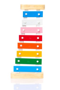Colorful wooden metal xylophone isolated on white clipart