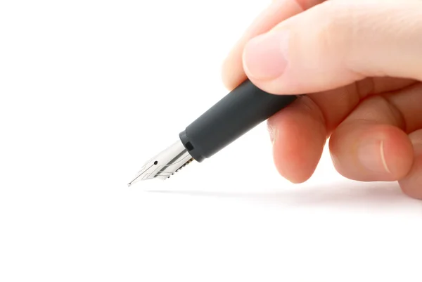Hand holding a pen — Stock Photo, Image