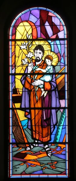 Saint Joseph tenant l'enfant Jésus — Photo