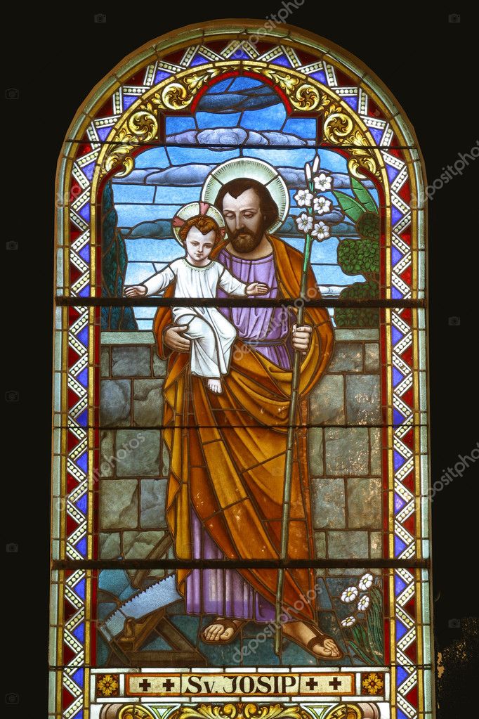 Saint Joseph holding baby Jesus Stock Photo by ©zatletic 4932281