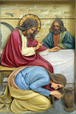 Mary Magdalene washes the feet of Jesus clipart