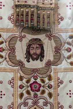 Golden embroidered church vestments clipart