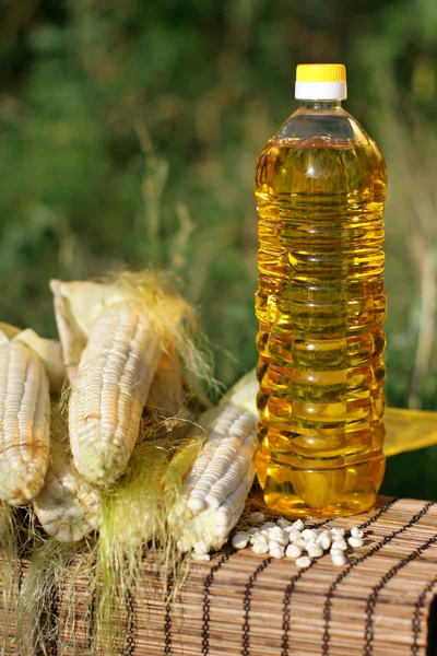 Oil and corn — Stock Photo, Image
