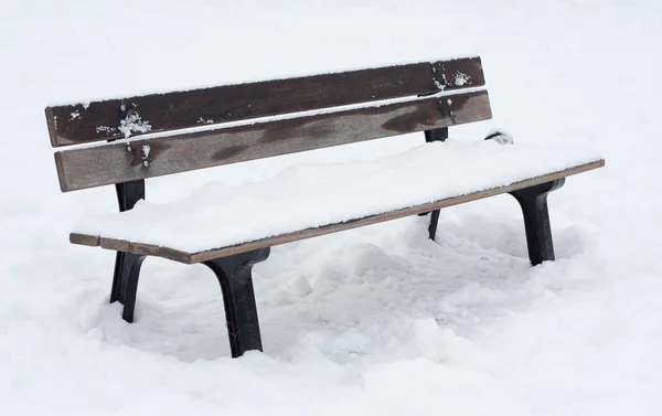 stock image Snow covered bench