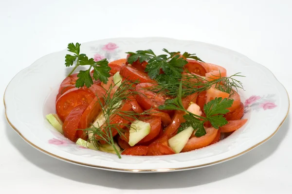 Salad with fresh tomatoes and cucumbers — Stock Photo, Image