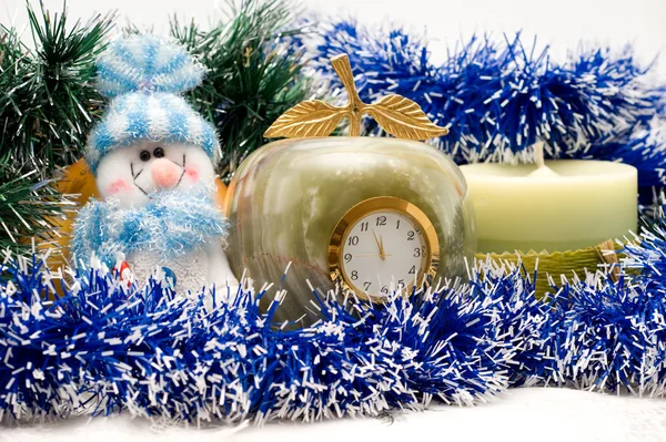 Desktop Clock, candle and snowman — Stock Photo, Image