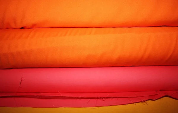 Uno Sfondo Tessuto Rotola Colori Vivaci — Foto Stock