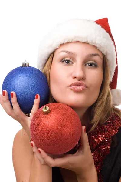 Las mujeres sonrientes sosteniendo el juguete de Navidad —  Fotos de Stock