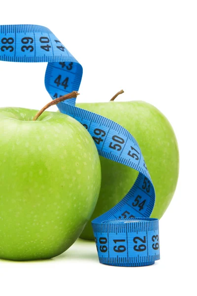 Grönt äpple med centimeter — Stockfoto