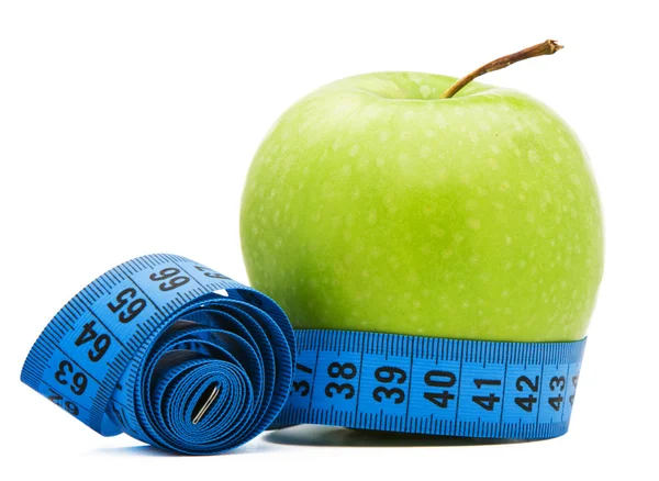 Grönt äpple med centimeter — Stockfoto