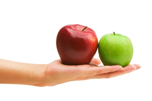 Dvě jablka na ruku — Stock fotografie