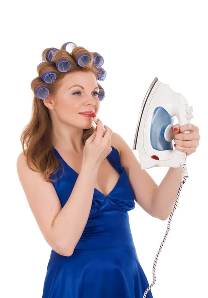 House wife using iron to apply makeup — Stock Photo, Image