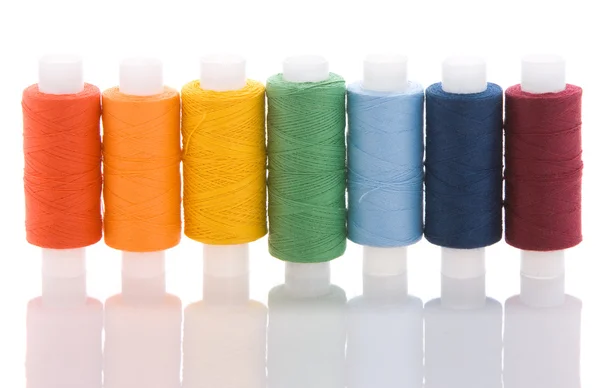 Seven spools with thread — Stock Photo, Image