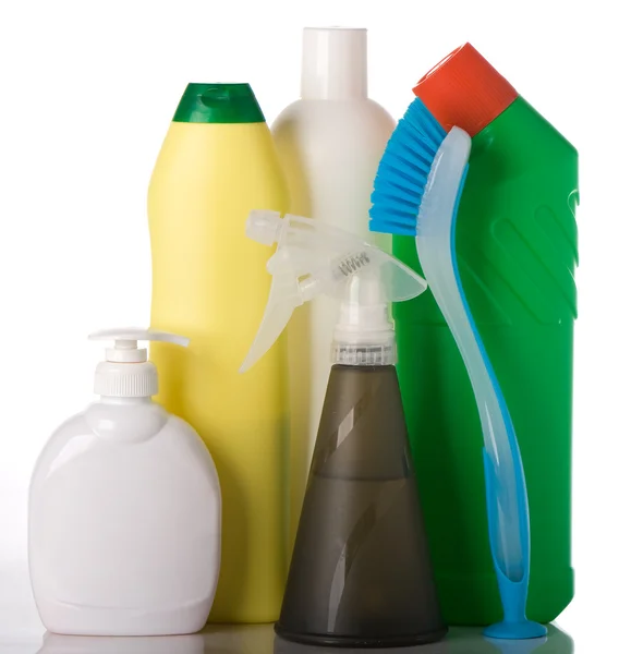 Botellas con líquidos de lavado y cepillo de limpieza —  Fotos de Stock