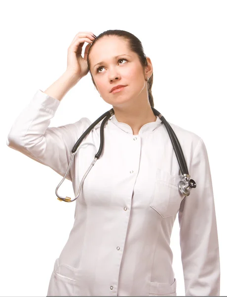 Young beautiful doctor thinking — Stock Photo, Image