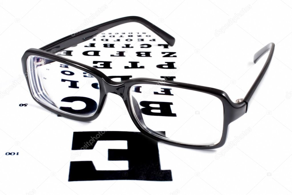 Glasses with TABLE VERIFICATION OF VIEW on a white background (selective focus)