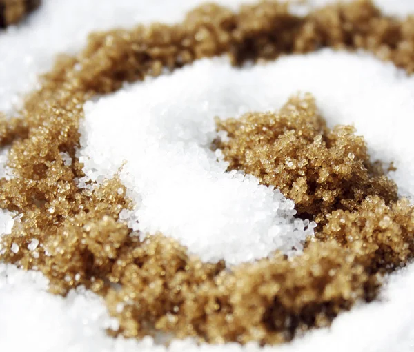 Espiral com açúcar branco e mascavo — Fotografia de Stock