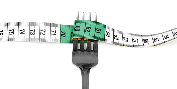 Tenedor y cinta métrica —  Fotos de Stock