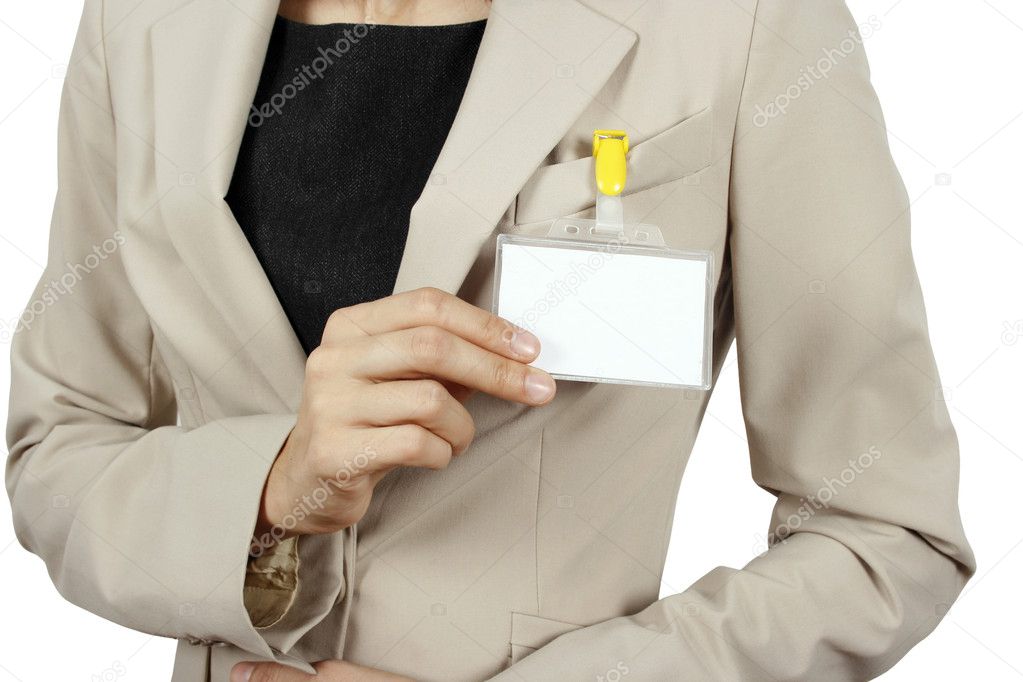 Woman showing her badge