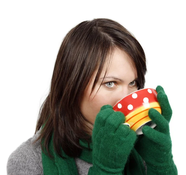 Kvinde drikker en varm drik - Stock-foto