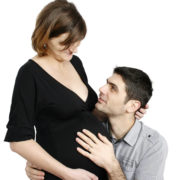 Mãe e pai com as mãos na barriga — Fotografia de Stock
