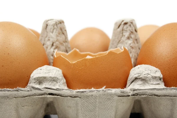 stock image Broken egg in eggbox