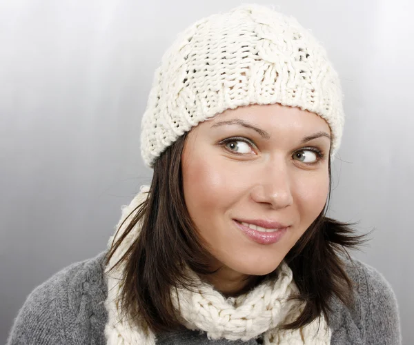 Woman in cap and scarf — Stock Photo, Image