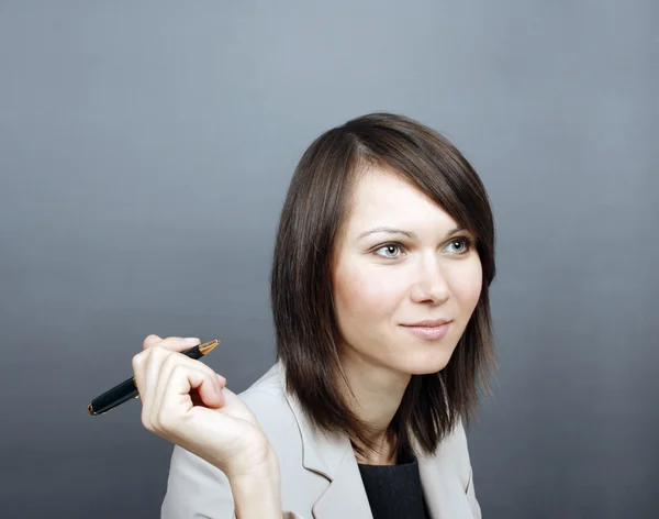 Vrouw met een pen — Stockfoto