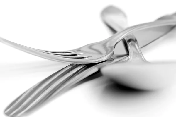 Cuillère, couteau et fourchette brillants — Photo