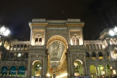 Night shot of the famous Galleria Vittorio Emanuele II in Milan clipart