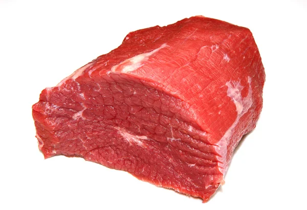 Beyaz arka plan üzerinde izole büyük kırmızı et yığın — Stok fotoğraf