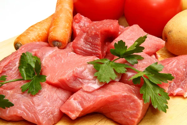 Carne fresca cruda cortada en cubitos — Foto de Stock