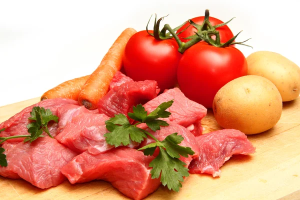 Carne fresca cruda cortada en cubitos — Foto de Stock