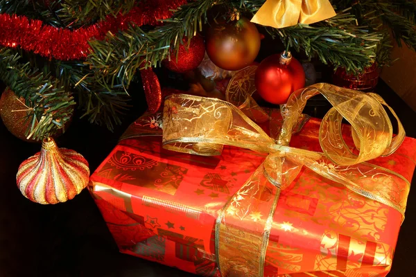 Christmas tree and gift Stock Picture