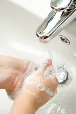 Woman washing hand clipart