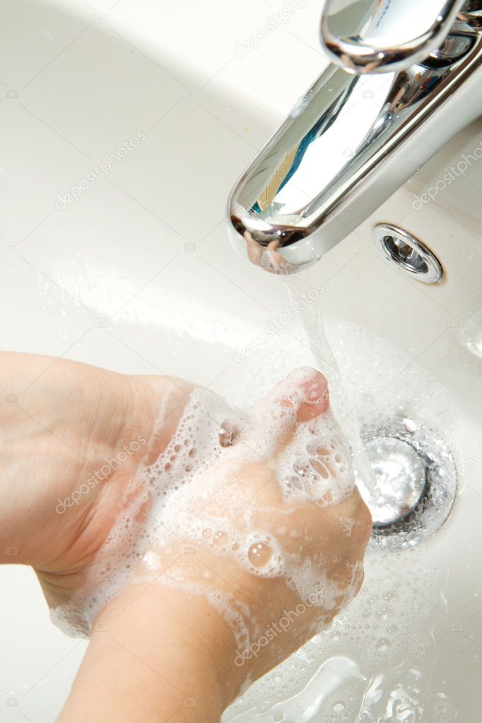 Woman washing hand