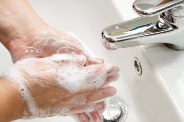 Woman washing hand clipart