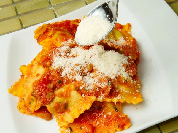 Ravioli pasta with red tomato sauce — Stock Photo, Image