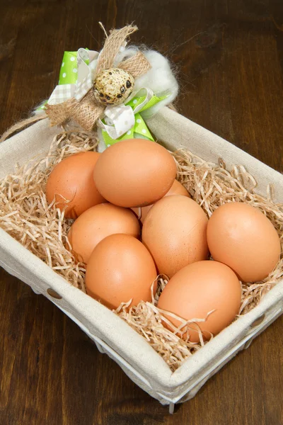 Brown eggs in a basket — Stock Photo, Image