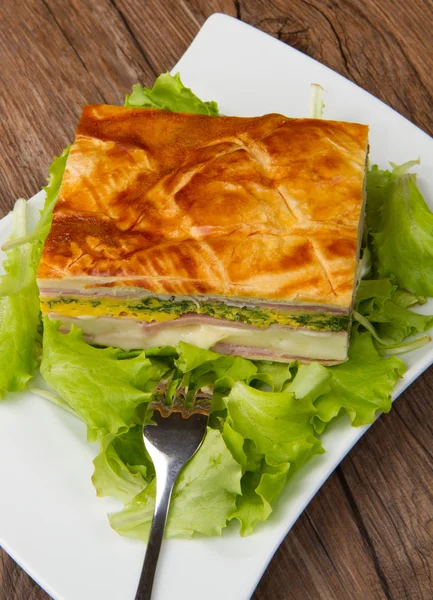 Pie with ham and cheese — Stock Photo, Image
