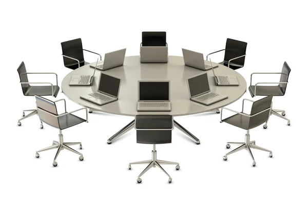 Round table with chairs and laptops — Stock Photo, Image