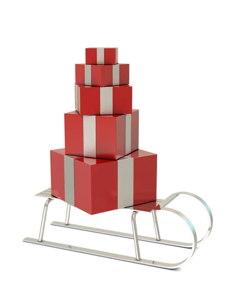 Trineo de plata y cajas de regalo rojas —  Fotos de Stock
