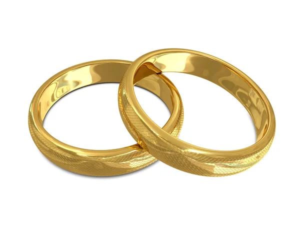 Zlaté prsteny na bílém pozadí — Stock fotografie