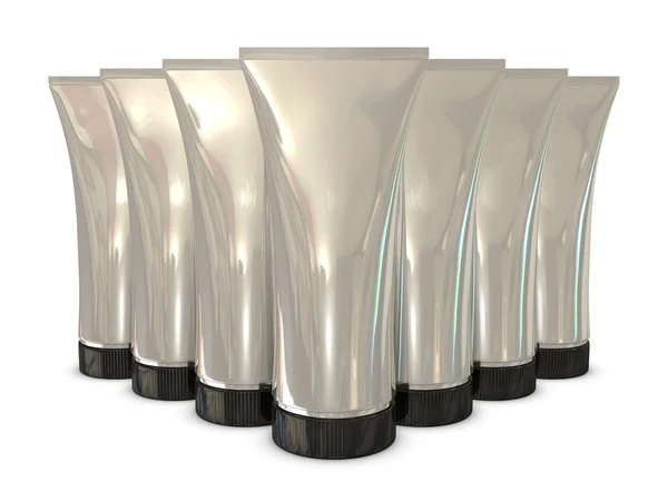 Grupo de embalagens de tubo de prata com tampas pretas — Fotografia de Stock