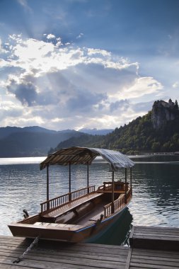 Boat in Bled Lake in Slovenia clipart