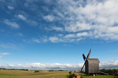 Old Wooden Windmills In Sweden clipart