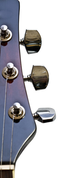 6 string guitar strings on white closeup