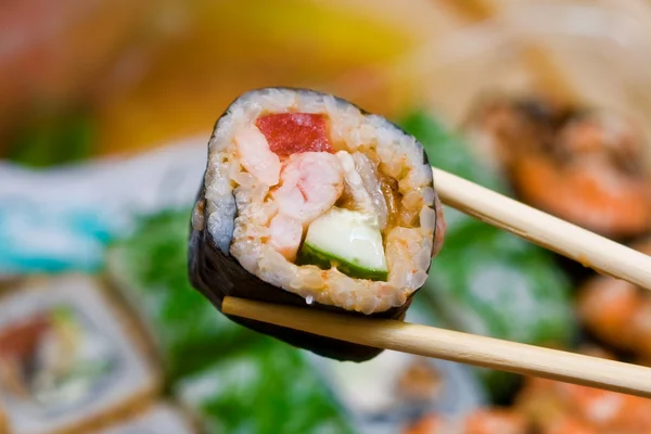 Japanese rolls and chopsticks — Stock Photo, Image