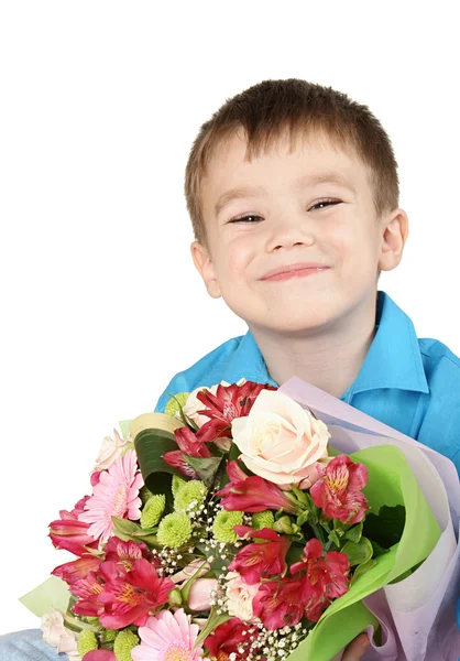 Um menino com buquê de flor — Fotografia de Stock